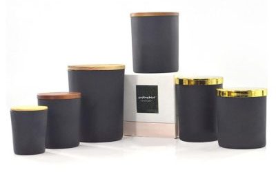Empty black glass candle jars with wooden lids (4)